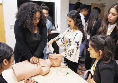 People learning CPR